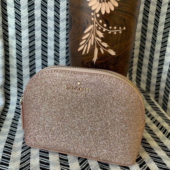 kate spade Handbags - Small dome cosmetic rose gold Kate spade new